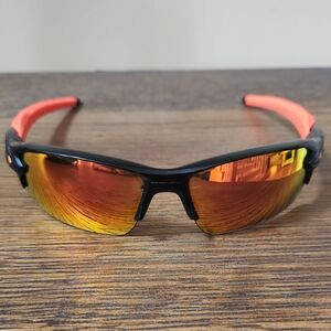 Oakley Sunglasses with Black Frame and Orange Lenses